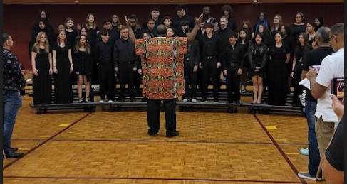 Mr. Crenshaw directs the choir performance celebrating Black History Month